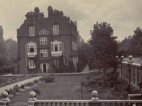 A black and white photograph of a walled garden that used to sit behind Old Hall at Lady Margaret Hall