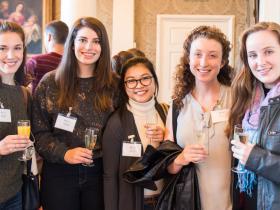 Group of Visiting Students having a drink in the Old Library
