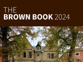 A Close up of the cover of the Brown Book 2024