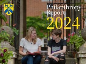 Text: Philanthropy Report 2024 and a picture of two students sitting on some brick steps