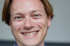 Close up portrait of Tom Littler