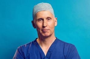 Professor Andrew Hayes dressed in his blue surgical gear