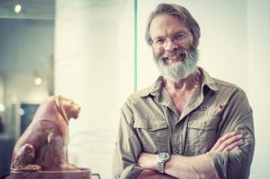 Professor David Macdonald, who has grey hair and a beard and thin silver-framed glasses