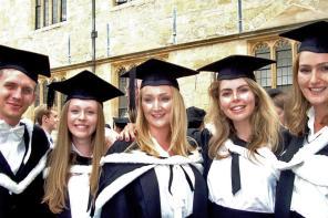 Paul McClean graduating with his French class