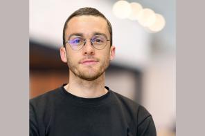 Sean Burnap, who has short dark hair and glasses