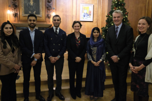 A group of men and women including Oxford Vice Chancellor Irene Tracey, Malala Yousafzai and Professor Stephen Blyth at an event celebrating the Oxford Pakistan Programme