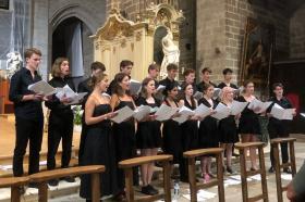 Photo of the LMH Choir performing in a church in France