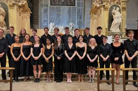 A photo of the LMH Choir performing in a church in France
