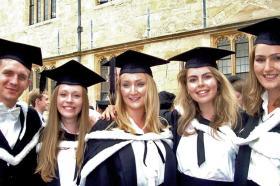 Paul McClean graduating with his French class