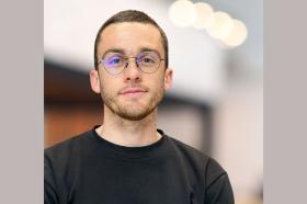 Sean Burnap, who has short dark hair and glasses