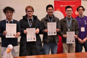 Four male students holding certificates and wearing medals at the PLANCKS preliminaries 2025