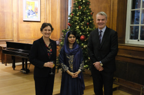 University of Oxford Vice Chancellor Irene Tracey stands smiling alongside Malala Yousafzai and Professor Stephen Blyth at a celebration hosted at LMH
