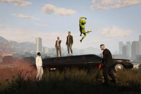 a still from 'Grand Theft Hamlet' depicting a group of human avatars standing around a stretch limo while a green alien jumps into the air