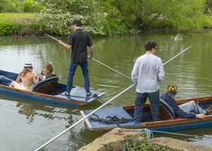 Students punting on the river at LMH