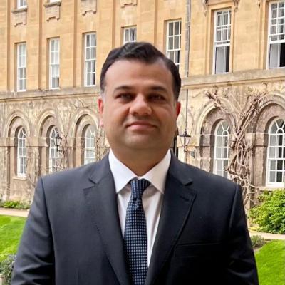 Photo of Ahmed Salman in the grounds of Worcester College