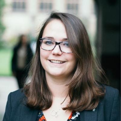 Shophie Nicholls, who has long dark brown hair and glasses