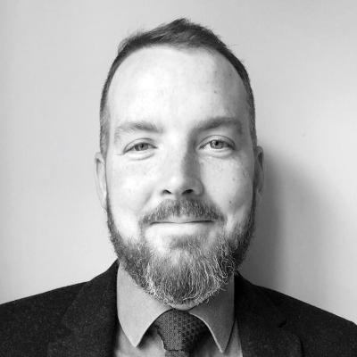 Black and white photo of Dr David Campbell