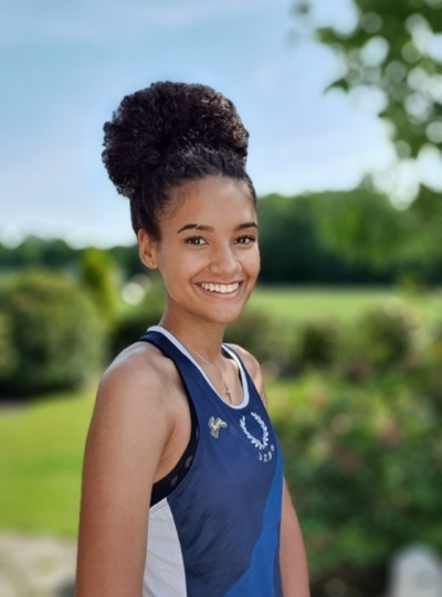 Photo of Jewel Bennett wearing an athletics vest