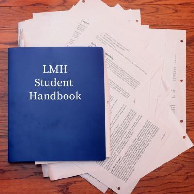 A blue book with papers spilling out of it with the words: LMH Student Handbook