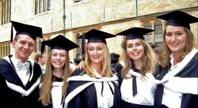 Paul McClean graduating with his French class