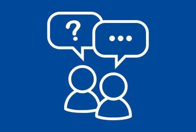 A blue background with a white graphic showing an outline of two people with speech bubbles signifying someone asking questions